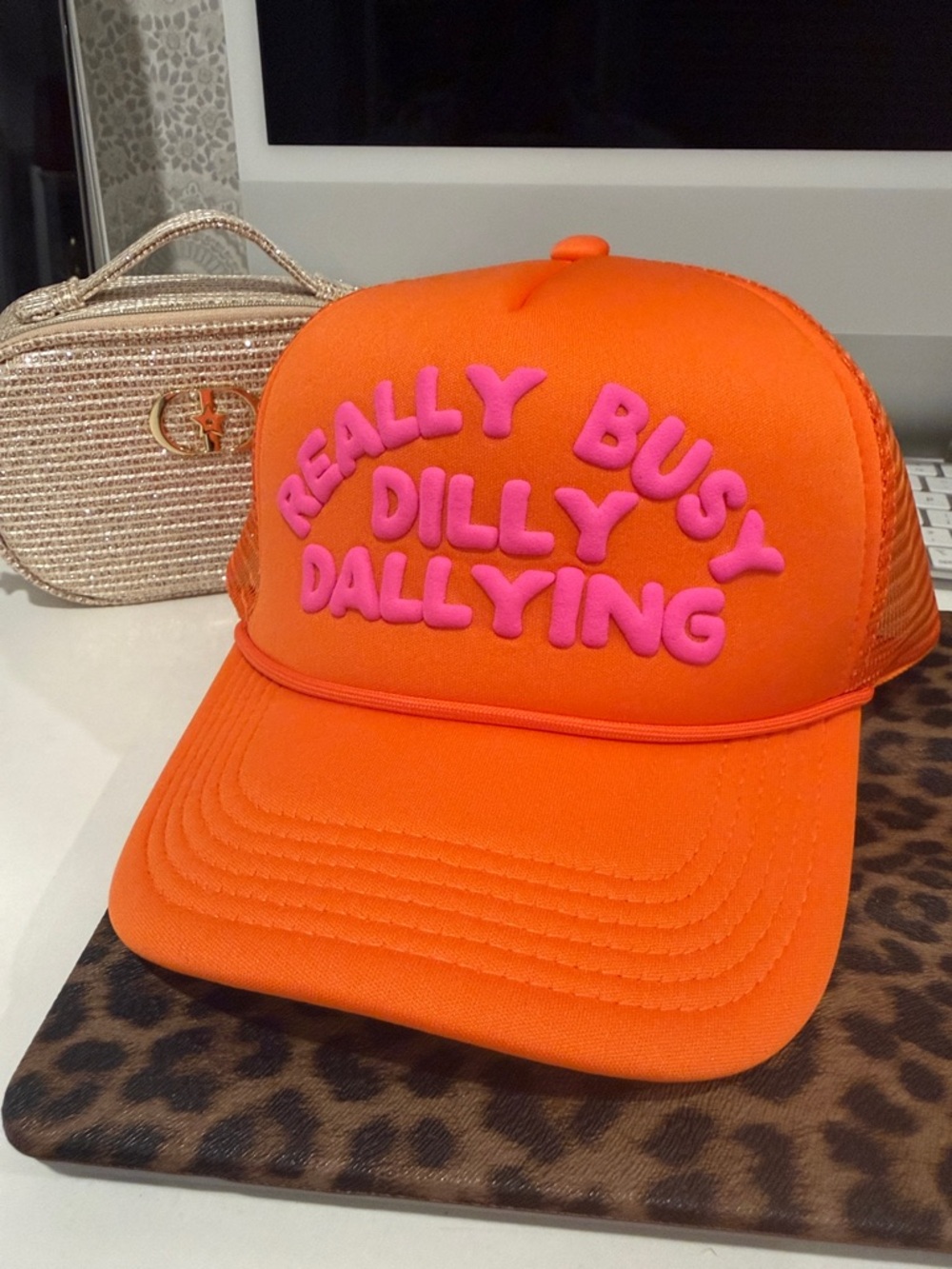 Orange Trucker Hat with Pink Foam Text - Really Busy Dilly Dallying
